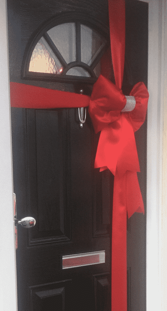 Red Diamanate centre padded door bow
